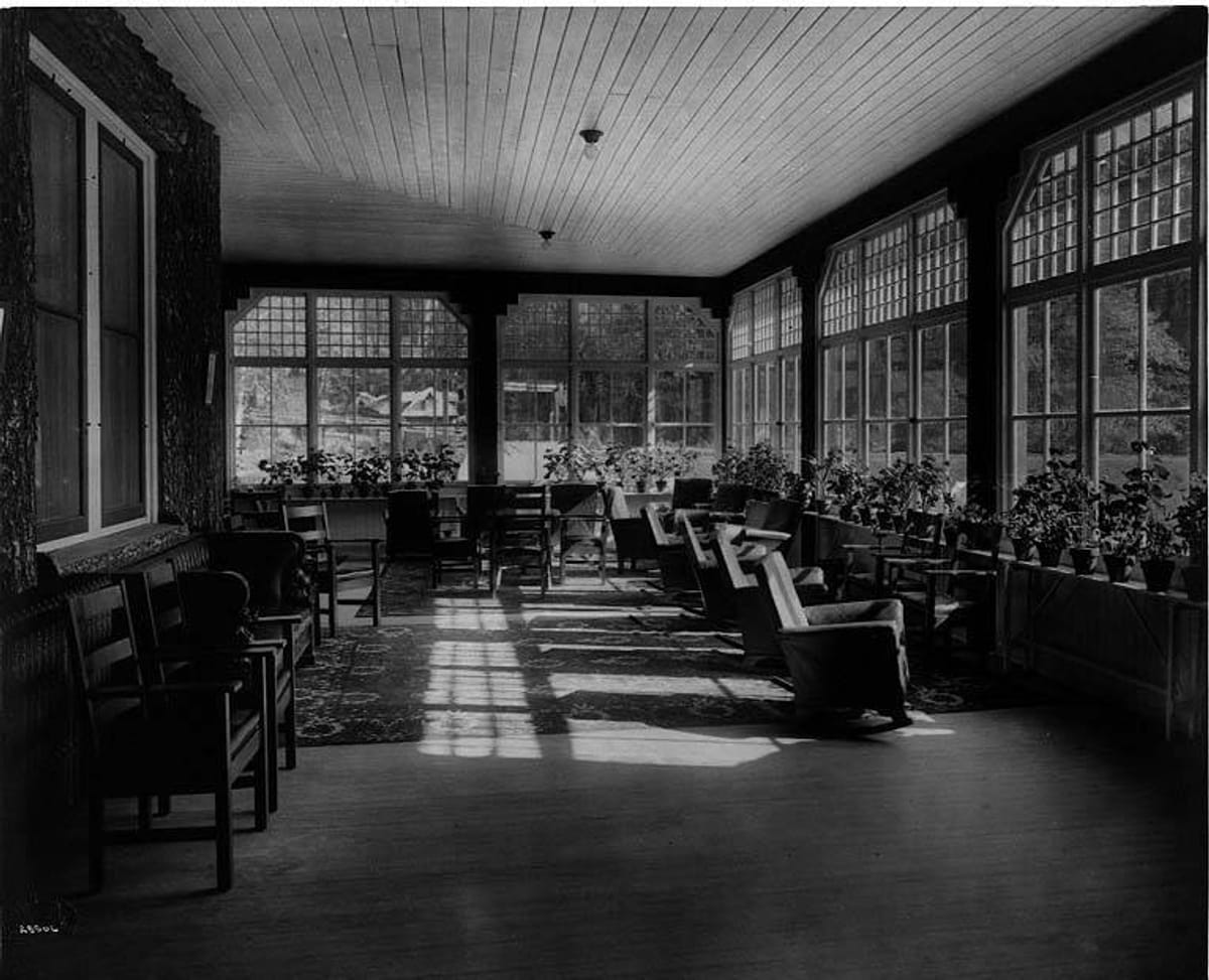 Interior of solarium porch at Sol Duc Hot Springs resort (CURTIS 350).jpeg
