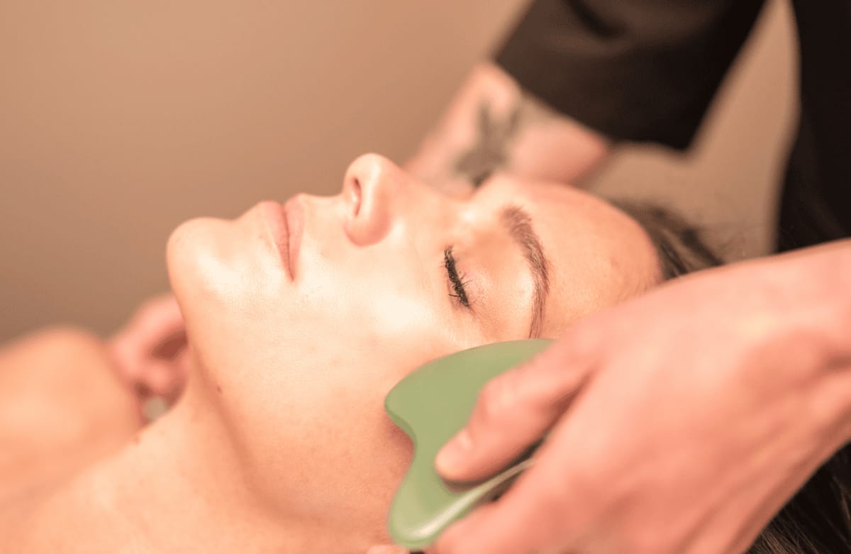 Woman receiving a thermal mineral spa treatment at The Springs Resort in Pagosa Springs, Colorado.